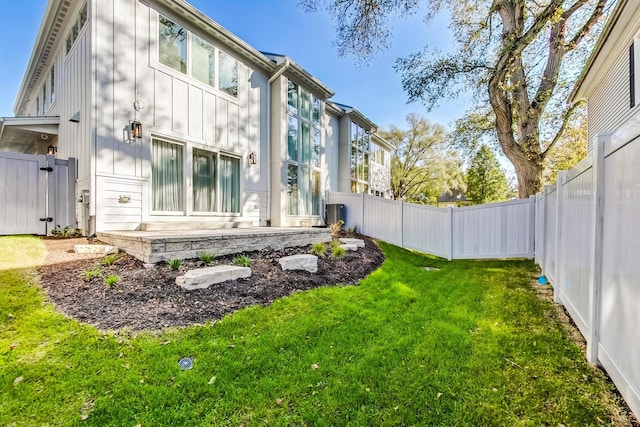 828 E Franklin Ave, Naperville, IL 60540 - rear view of property with board and batten siding