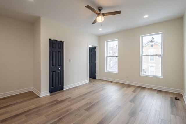 1013 W 18th Pl, Chicago, IL 60608 - unfurnished room with a ceiling fan, baseboards, light wood-style floors, and recessed lighting