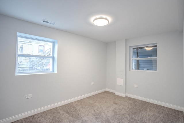 1013 W 18th Pl, Chicago, IL 60608 - spare room with carpet and baseboards