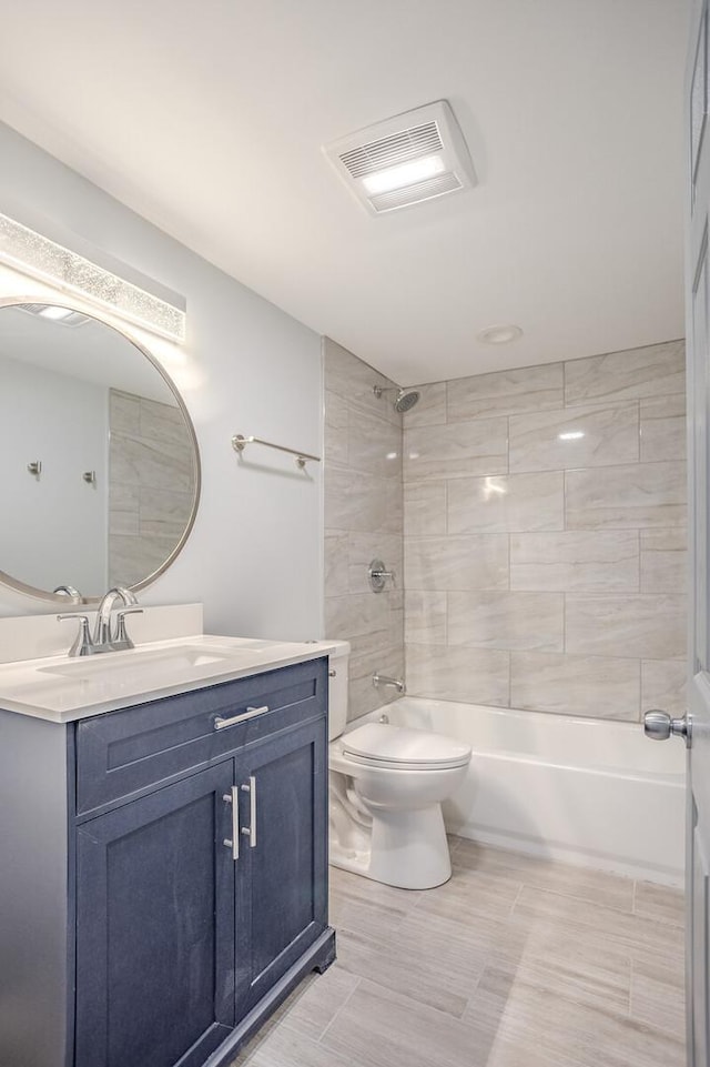 1013 W 18th Pl, Chicago, IL 60608 - bathroom featuring toilet, vanity, and shower / bathtub combination