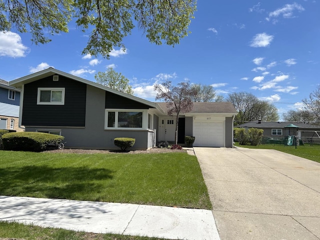 617 S Albert St, Mount Prospect, IL 60056 - view of front facade with a garage, driveway, and a front lawn