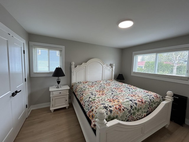 617 S Albert St, Mount Prospect, IL 60056 - bedroom with light wood-style floors and baseboards