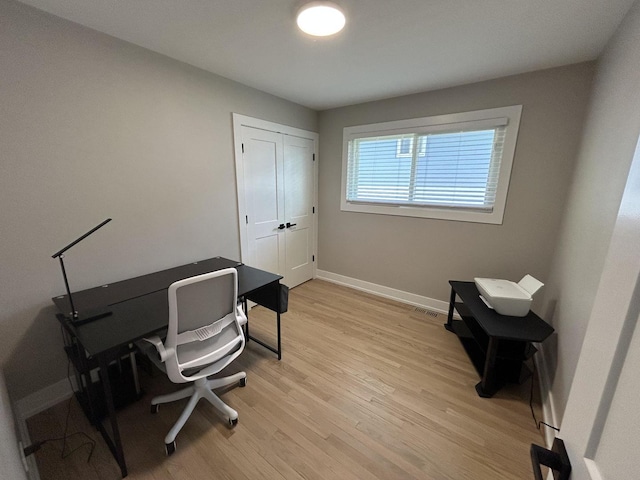 617 S Albert St, Mount Prospect, IL 60056 - home office with light wood-type flooring and baseboards
