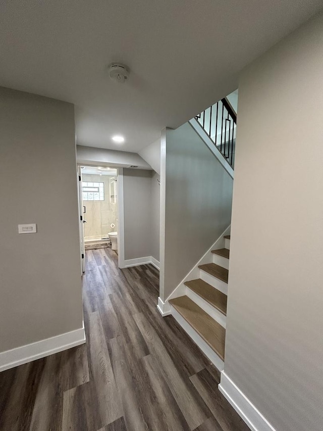 617 S Albert St, Mount Prospect, IL 60056 - hallway featuring dark wood finished floors, baseboards, and stairs
