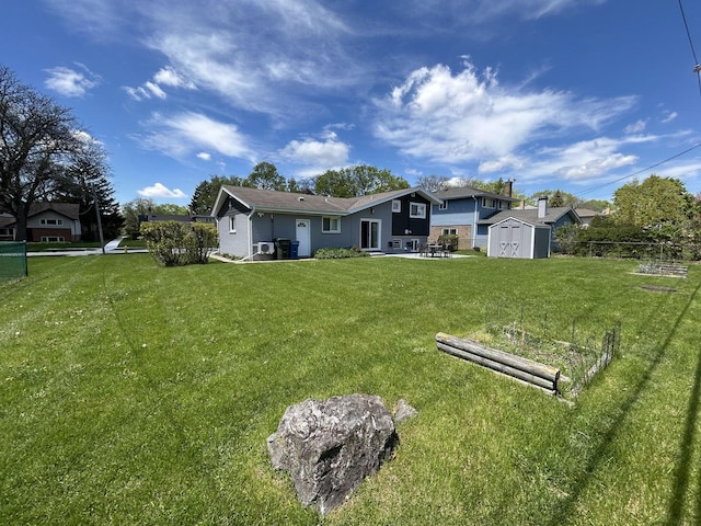 617 S Albert St, Mount Prospect, IL 60056 - back of property featuring a shed, an outdoor structure, and a patio