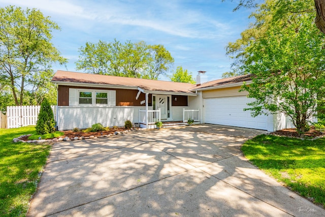 806 71st St, Darien, IL 60561 - ranch-style home with concrete driveway, a garage, brick siding, and covered porch