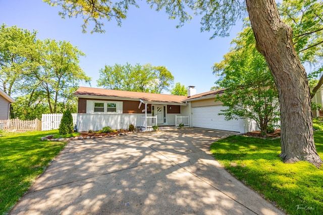 806 71st St, Darien, IL 60561 - view of front of property featuring concrete driveway, an attached garage, a chimney, and a porch