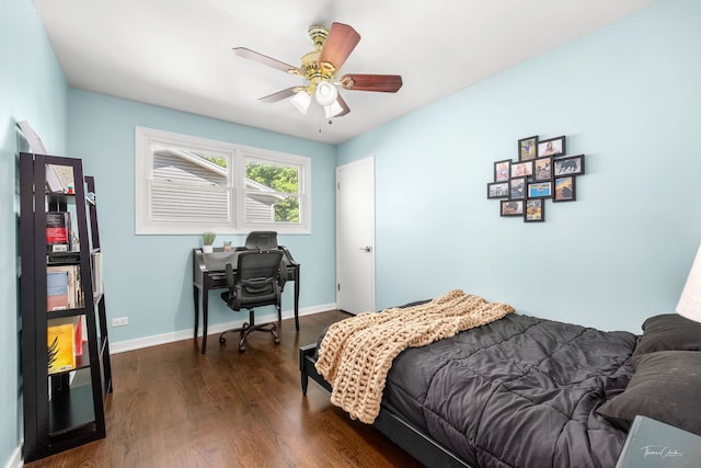 806 71st St, Darien, IL 60561 - bedroom with dark wood-type flooring, baseboards, ceiling fan, and an office area