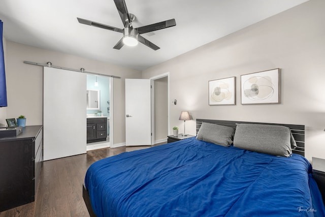 806 71st St, Darien, IL 60561 - bedroom featuring dark wood-style flooring, a barn door, ensuite bathroom, and ceiling fan