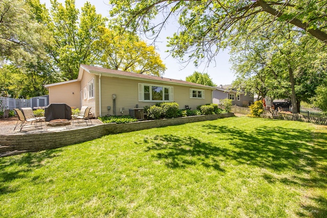 806 71st St, Darien, IL 60561 - rear view of property with an outdoor fire pit, a patio area, and central AC unit