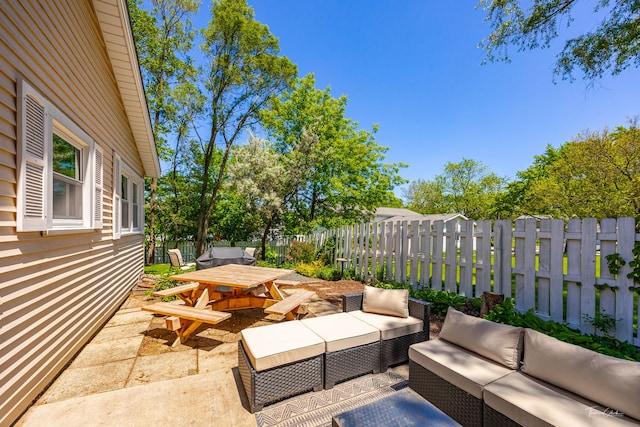 806 71st St, Darien, IL 60561 - fenced backyard featuring an outdoor living space, outdoor dining area, and a patio area