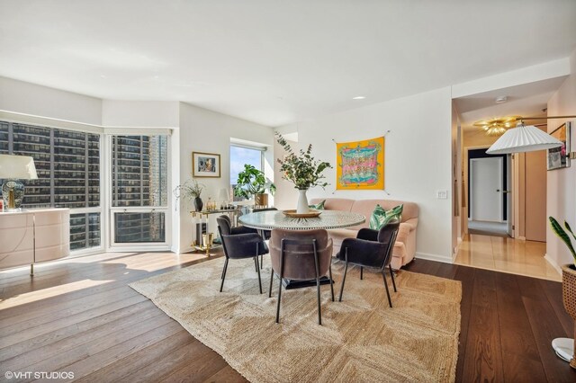100 E Huron St Unit 1806, Chicago, IL 60611 - dining space featuring hardwood / wood-style flooring