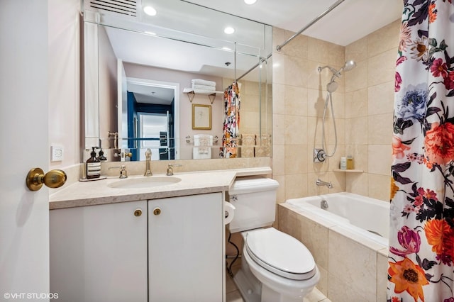 100 E Huron St Unit 1806, Chicago, IL 60611 - bathroom with tiled shower / bath combo, toilet, vanity, and recessed lighting