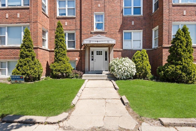 1637 S 48th Ct Unit 9, Cicero, IL 60804 - view of front of property with brick siding and a front yard