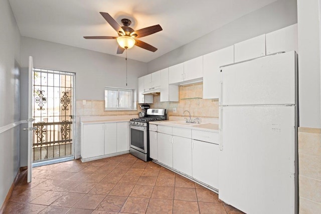 1637 S 48th Ct Unit 9, Cicero, IL 60804 - kitchen featuring freestanding refrigerator, stainless steel gas stove, light countertops, a ceiling fan, and backsplash