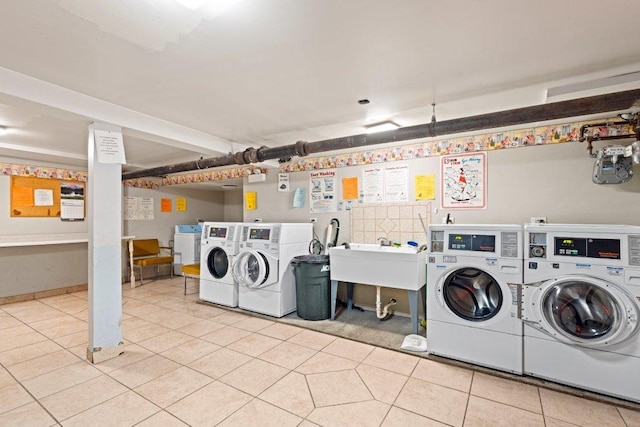 1637 S 48th Ct Unit 9, Cicero, IL 60804 - communal laundry room featuring washing machine and dryer and light tile patterned floors