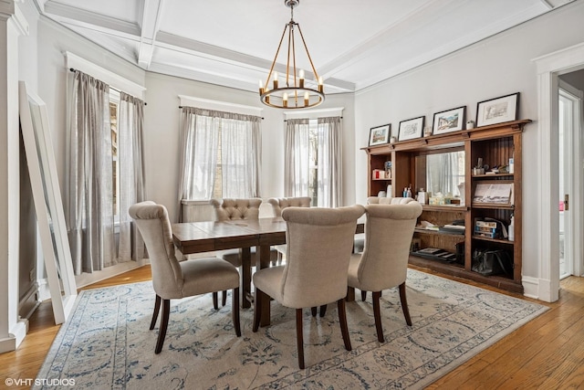 5830 N Glenwood Ave, Chicago, IL 60660 - dining room featuring a chandelier, light wood finished floors, beamed ceiling, crown molding, and coffered ceiling