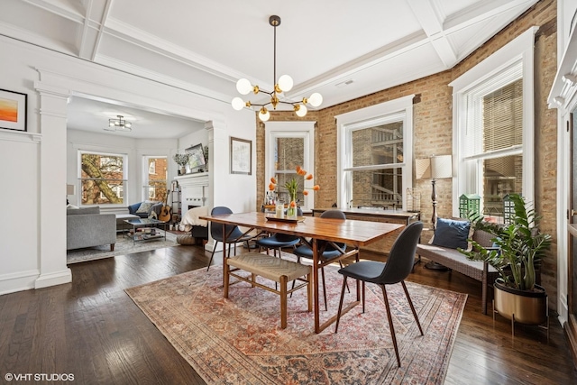 5830 N Glenwood Ave, Chicago, IL 60660 - dining room with coffered ceiling, a chandelier, dark wood-style flooring, beam ceiling, and ornamental molding