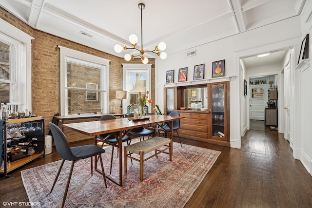 5830 N Glenwood Ave, Chicago, IL 60660 - dining room featuring coffered ceiling, dark wood-type flooring, a chandelier, beam ceiling, and brick wall