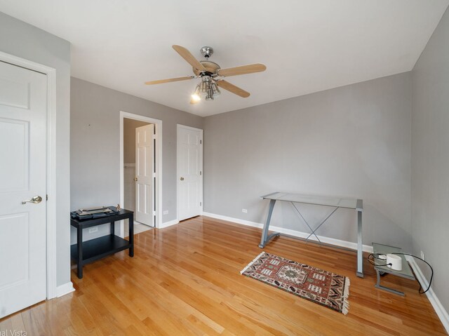 420 Ford Ln, Bartlett, IL 60103 - bedroom with light wood finished floors, baseboards, and a ceiling fan