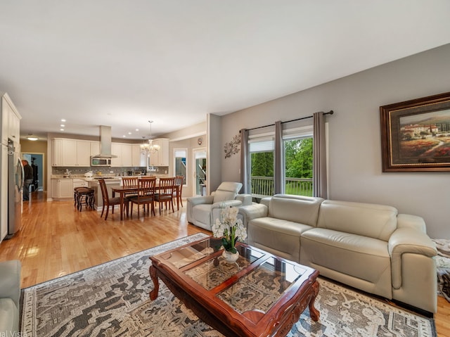 420 Ford Ln, Bartlett, IL 60103 - living room with a chandelier, light wood-style floors, and recessed lighting