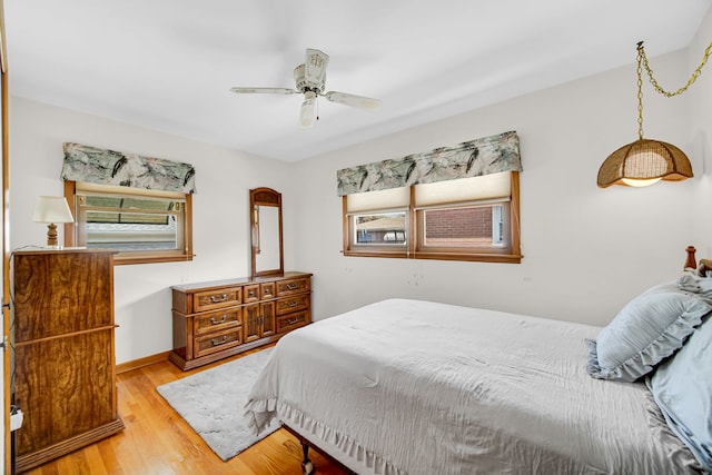 5112 N Oneida Ave, Norridge, IL 60706 - bedroom featuring light wood finished floors and ceiling fan