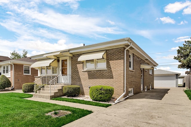 5112 N Oneida Ave, Norridge, IL 60706 - ranch-style house featuring brick siding, an outdoor structure, a garage, and a front yard