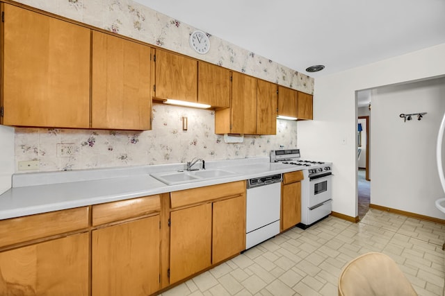 5112 N Oneida Ave, Norridge, IL 60706 - kitchen featuring white appliances, a sink, light countertops, brick patterned floors, and wallpapered walls