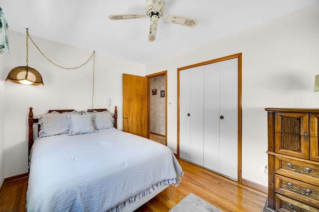5112 N Oneida Ave, Norridge, IL 60706 - bedroom featuring wood finished floors, a closet, and ceiling fan