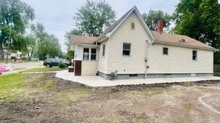 812 W Monroe St, Bloomington, IL 61701 - back of house featuring a chimney