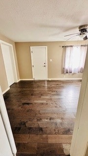 812 W Monroe St, Bloomington, IL 61701 - entryway featuring a textured ceiling, a ceiling fan, and baseboards
