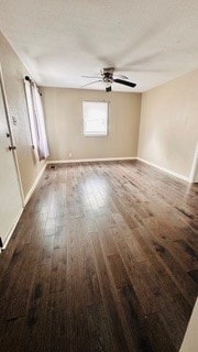 812 W Monroe St, Bloomington, IL 61701 - spare room featuring ceiling fan, wood finished floors, and baseboards
