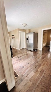 812 W Monroe St, Bloomington, IL 61701 - interior space featuring wood-type flooring and baseboards