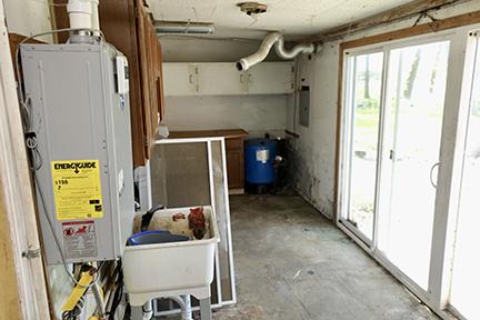 1803 Orchard Ln, Mchenry, IL 60050 - utility room with water heater and electric panel