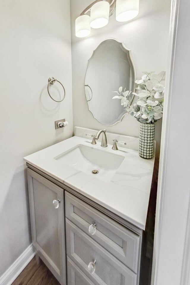2028 Valor Ct, Glenview, IL 60026 - bathroom with vanity, baseboards, and wood finished floors