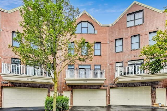2028 Valor Ct, Glenview, IL 60026 - view of apartment building / complex with a garage and driveway