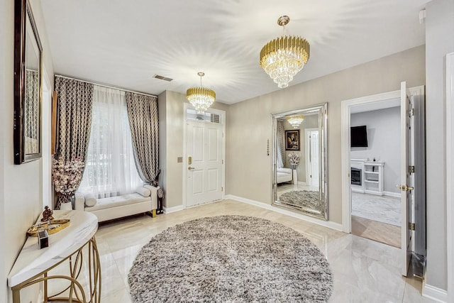 2028 Valor Ct, Glenview, IL 60026 - foyer entrance featuring a chandelier and baseboards