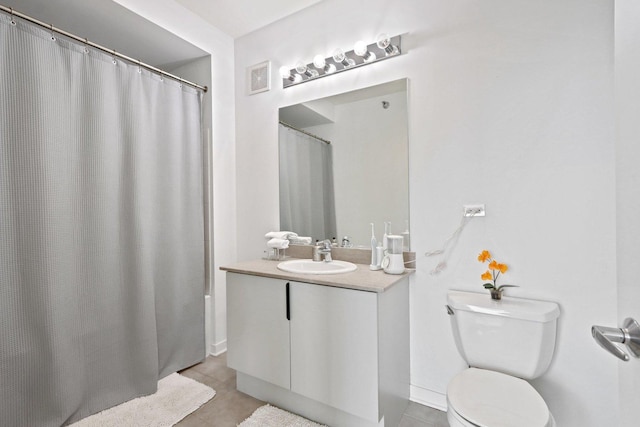 611 S Wells St Unit 2801, Chicago, IL 60607 - full bathroom with vanity, tile patterned floors, toilet, a shower with curtain, and baseboards