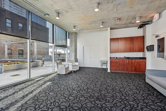 611 S Wells St Unit 2801, Chicago, IL 60607 - misc room with dark carpet, a sink, a towering ceiling, and floor to ceiling windows