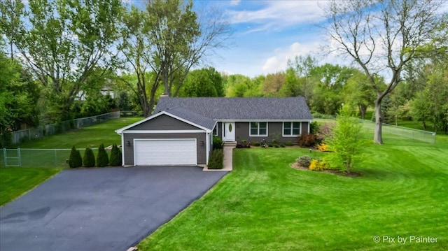 ranch-style home with asphalt driveway and an attached garage