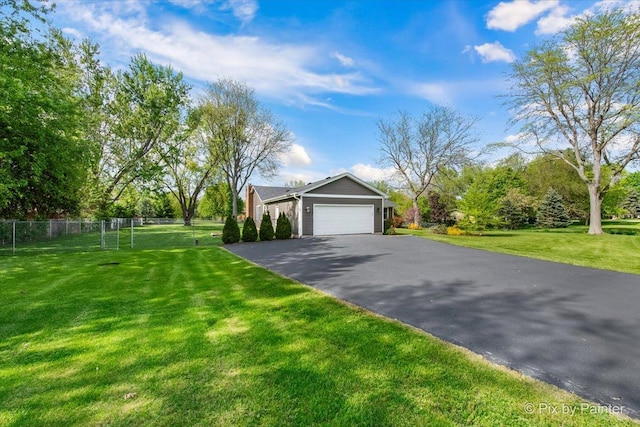 view of front of house with driveway and an attached garage