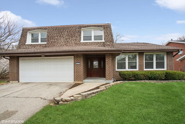 2006 Aldrich Pl, Downers Grove, IL 60516 - front facade with a shingled roof, driveway, a front lawn, a garage, and brick siding