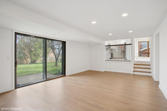 2006 Aldrich Pl, Downers Grove, IL 60516 - unfurnished living room featuring light wood-type flooring, baseboards, recessed lighting, and stairway