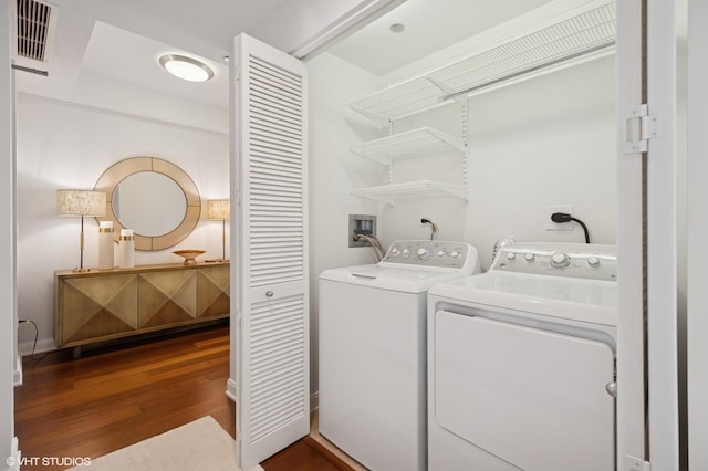 60 E Monroe St Unit 6203, Chicago, IL 60603 - washroom with wood finished floors and washer and dryer