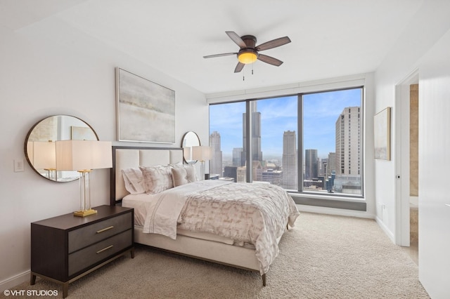 60 E Monroe St Unit 6203, Chicago, IL 60603 - bedroom with carpet floors, a skyline view, baseboards, and ceiling fan