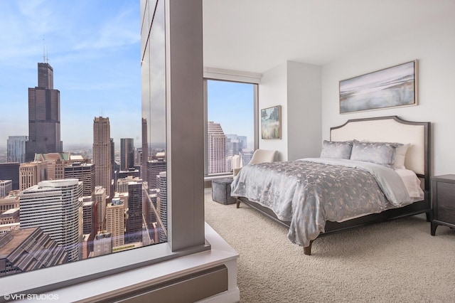 60 E Monroe St Unit 6203, Chicago, IL 60603 - carpeted bedroom featuring a view of skyline and a wall of windows