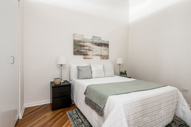 210 S Desplaines St Unit 402, Chicago, IL 60661 - bedroom featuring wood finished floors and baseboards