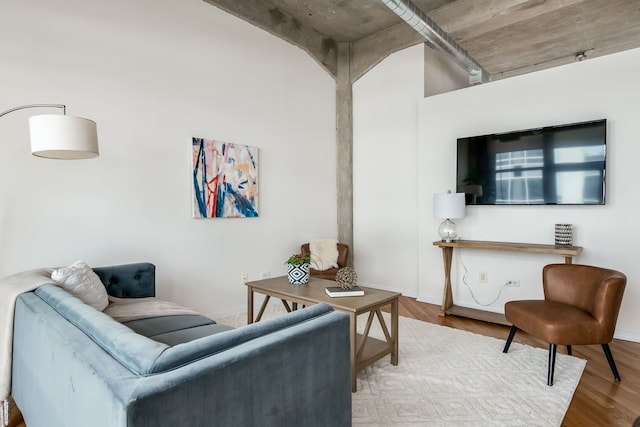 210 S Desplaines St Unit 402, Chicago, IL 60661 - living room with baseboards and wood finished floors
