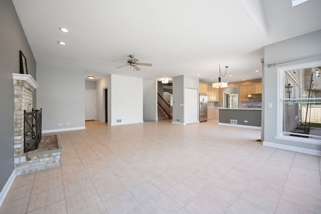 9231 N Natchez Ave, Morton Grove, IL 60053 - unfurnished living room featuring a ceiling fan, a brick fireplace, stairway, recessed lighting, and light tile patterned floors