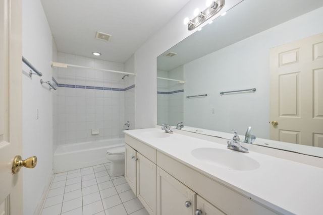 9231 N Natchez Ave, Morton Grove, IL 60053 - full bathroom featuring tile patterned floors, toilet, double vanity, baseboards, and shower / tub combination